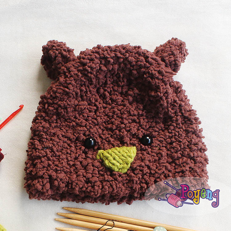 Fluffy lamb-shaped baby hat knitted in soft marshmallow-texture yarn